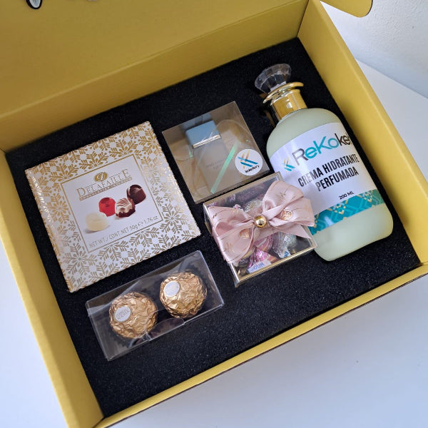 KoketBox - Una miniatura de Light Blue By Dolce and Gabbana + Crema Perfumada+ Mini Box Hershey's Kisses  y Chocolates